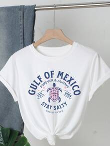 海湾海龟图案T恤，宽松休闲适合夏季海滩度假，女士纯色圆领短袖简约上衣