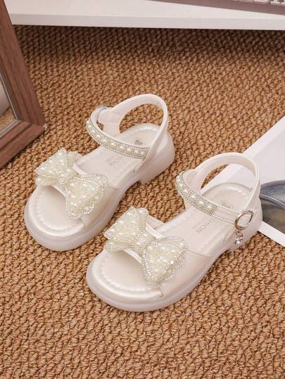 1 par de sandalias de niña con diseño de decoración de perlas falsas y rhinestones, de punta abierta, suela blanda antideslizante, sandalias de princesa versátiles y de moda para niños mayores, adecuadas para el verano
