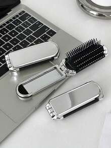 1 chiếc lược mini gấp gọn dễ thương, di động tiện lợi cho nữ, kèm gương nhỏ và đệm mềm - Bạc - Xem 1
