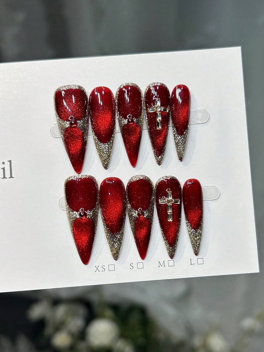 10片手工美甲片，尖头杏仁形，长款尖头按压式美甲片，优雅红色美甲片，闪亮猫眼，金色边缘闪粉，镶嵌钻石十字架美甲饰品，简约前卫又不失温柔奢华，适合冬季、春季等各种场合，也适合派对、日常、约会、海滩、热带度假等，DIY美甲，适合女性和女孩作为礼物，手工美甲用品。 - 紅色 - 查看 1