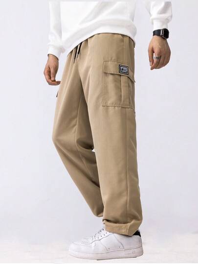 男士休闲工装裤，宽松直筒版型，垂感好，适合居家休闲和户外活动，也是情侣送礼佳品。采用100%涤纶面料，配有抽绳腰带，可调节松紧，多种颜色可选。