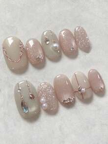 10片手工制作的按压式美甲贴片，短椭圆形，粉色梦幻星空设计，粉紫色猫眼闪粉，饰以水钻和珍珠，温柔简约的按压式美甲贴片，适合女性和女孩，可用于春、夏、秋、冬四季的节日、派对和日常佩戴。 - 彩色 - 查看 2