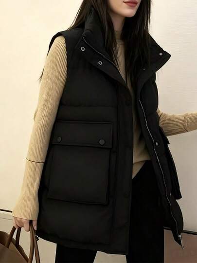 Chaqueta de algodón plumón chaleco medio largo bolsillo grande Chaleco tipo cárdigan para mujer con cierre de cremallera Chaqueta de algodón con relleno de plumón para otoño/invierno Prendas de abrigo holgadas Chalecos Chalecos de algodón con relleno de plumón para otoño/invierno para mujer Chaleco negro con bolsillos grandes Cuello alto Cierre de cremallera y botones Chaleco cálido y holgado