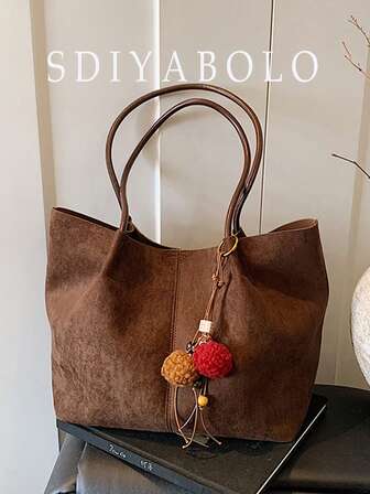Nueva bolsa de mano grande de otoño/invierno para mujeres, bolso de hombro versátil y minimalista casual para el trabajo y el transporte