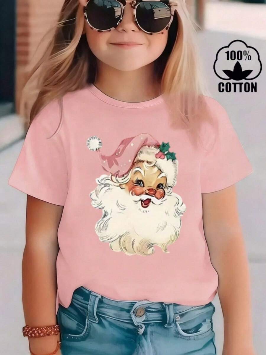 Esta nueva camiseta de manga corta para niñas, 100% algodón, luce modernos estampados de Papá Noel, informal y versátil. Confeccionada con un tejido suave y delicado con la piel, es suave con la piel sensible de tu hija, permitiéndole libertad de movimiento y comodidad durante reuniones familiares, actividades escolares o juegos al aire libre. - Rosa - Ver 1