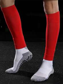 一套青少年足球护腿套+袜套，中筒防滑运动护腿套，采用涤纶针织面料，适合12岁及以上男孩女孩穿着。 - 彩色 - 查看 4