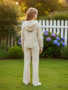 Tween Girl 2-Piece Casual Fashion Street Style Girls' Clothing Set, Knitted Long-Sleeved Hoodie And Flared Pants, Solid Color, Suitable For Home And Outdoor Casual Wear.