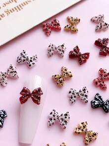 50 pezzi Stili invernali, decorazioni per unghie con fiocco a stampa leopardata, prodotti per unghie, fai da te, accessori per unghie, ornamenti per unghie, adatti per decorare le unghie, saloni di manicure - Multicolore - Visualizzare 1