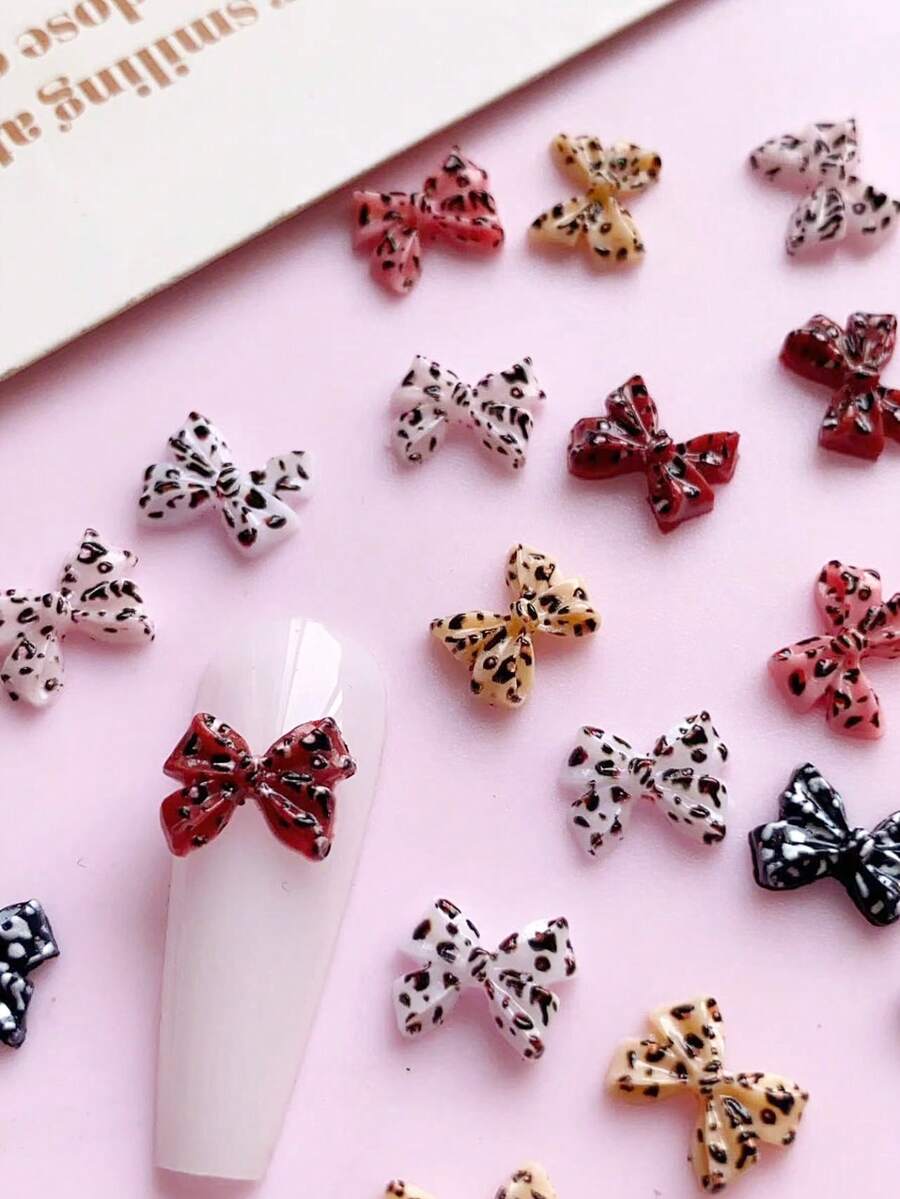 50 pezzi Stili invernali, decorazioni per unghie con fiocco a stampa leopardata, prodotti per unghie, fai da te, accessori per unghie, ornamenti per unghie, adatti per decorare le unghie, saloni di manicure - Multicolore - Visualizzare 1