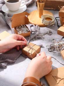 50 chiếc - Hộp quà mini bằng giấy Kraft, hộp giấy nhỏ, hộp đóng gói mini hình máy bay, hộp đựng trang sức đa năng, thích hợp đựng nhẫn, bông tai, quà cưới, sinh nhật, ngày lễ, Giáng sinh, trưng bày trang sức, vật tư đóng gói, quà tặng tiệc tùng, hộp quà thủ công tự làm. - màu nâu - Xem 2