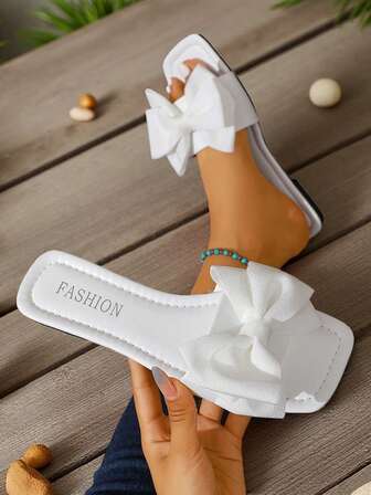 Sandalias planas con lazo clásico para mujer, sandalias planas casuales de vacaciones blancas para damas, adecuadas para la playa, viajes, citas, fiestas, sandalias deslizantes portátiles de una correa para mujer