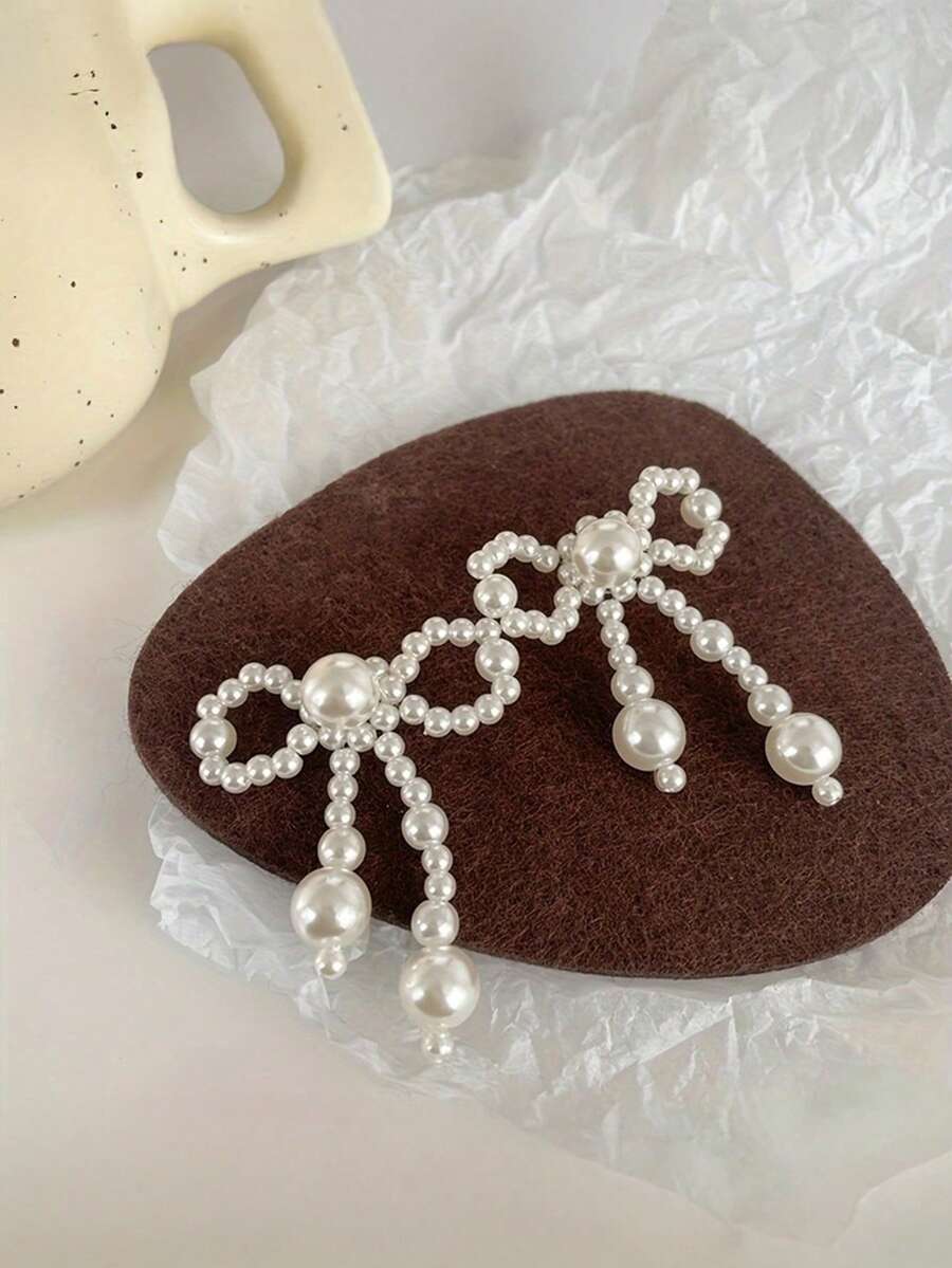 10个手工编织珍珠蝴蝶结装饰品,心形DIY工艺品,服装和派对装饰配件,无需电源,是父亲节、母亲节、情人节的理想礼物。 - 白色 - 查看 1