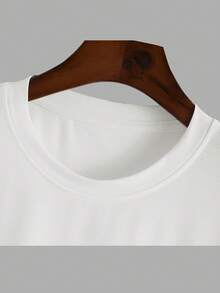 Disney Valentine's Day Pajama Gift Set. Men's Apparel. Mickey Mouse Graphic Tee With Mickey Shaped Ring Pattern. White Short Sleeve T-Shirt Paired With Black Casual Sweatpants. Men's 2-Piece Set. Men's Autumn Outfit - Black and White - View 5