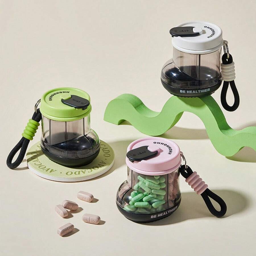 Boots便携式四格旋转药盒，带锁扣和透明盖 - 防潮药盒，带标签隔层，塑料材质，带钥匙锁，适合旅行、居家或外出时存放药物 - 是日常药物管理的理想之选，密封防潮 - 彩色 - 查看 1