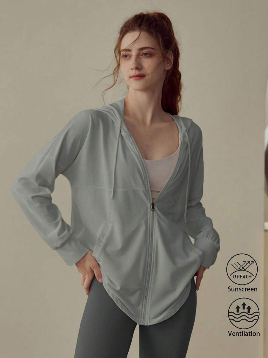 Never me Atasan Yoga Wanita Berkualitas Tinggi, Cocok untuk Lari Pagi, Jaket Kebugaran Profesional, Pakaian Luar Ringan Pelindung Matahari untuk Lari Musim Semi - Light Grey - View 1