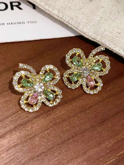 一对镂空花叶造型耳环，镀金镶嵌水钻，独特的925纯银耳钉