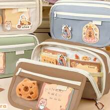 水豚大号背包套装，可爱轻便舒适的书包，适合低年级学生，大容量背包可减轻负重并保护脊椎，包含黑色墨水笔和铅笔盒，大容量多层铅笔盒，返校季必备文具，是学生和圣诞礼物的理想之选。