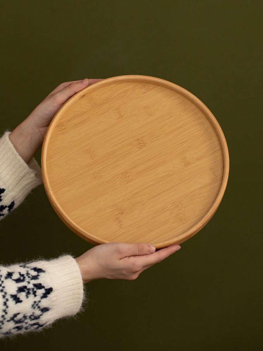 1个圆形木质托盘，适用于盛放零食、甜点、饼干、开胃菜等，用途广泛。