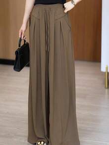 Elegantes pantalones culotte Yamamoto de cintura alta, con pliegues, drapeados, sueltos y holgados Pantalones ligeros y casuales de pierna ancha para mujer, para primavera/otoño. Elegantes, con pliegues, tallas grandes, cintura alta, corte holgado y relajado, estilo Yamamoto, con botones en la cintura y cordón ajustable. Pantalones casuales de pierna ancha y color liso. - Café integral - Ver 1