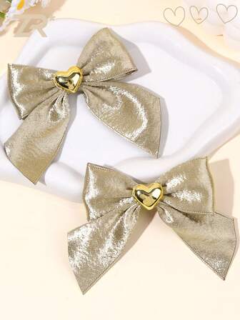 2 pièces Pinces à cheveux en forme de nœud avec cœur doré pour filles et adolescentes, pinces à cheveux élégantes en forme de nœud, barrettes à la mode pour fête, nœuds pour cheveux de femmes, accessoires de cheveux exquis, accessoires de cheveux pour la vie quotidienne