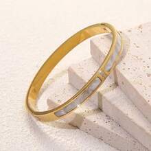1 pieza Pulsera de acero inoxidable para mujer, color dorado/plateado con diseño de concha incrustada de rhinestone, brazalete minimalista y de moda con cierre, mejor regalo para la madre, adecuado para viajar - forma de huevo - Ver 6