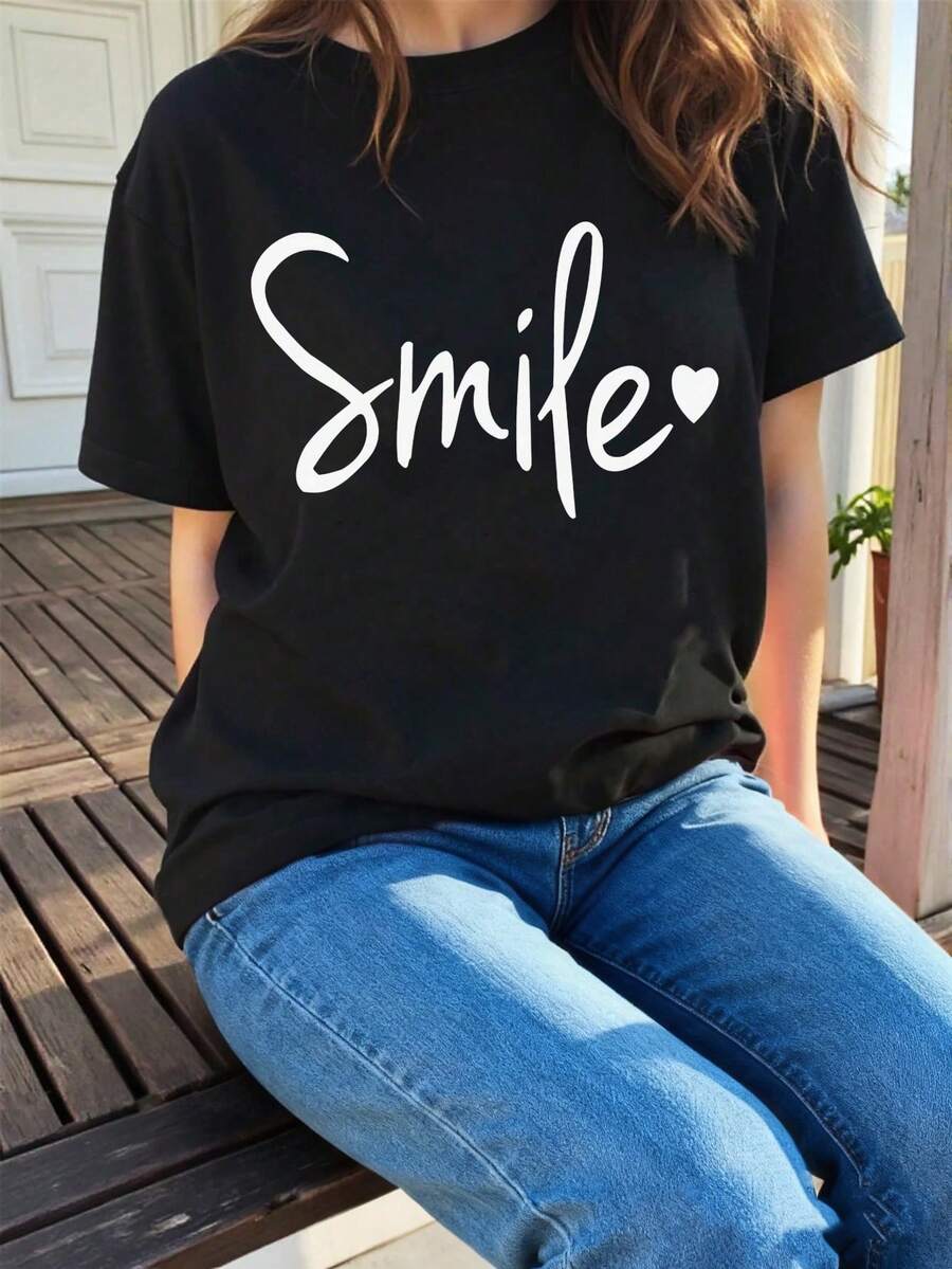 Camiseta de manga corta casual con cuello redondo y estampado de letra sonriente, suave y cómoda para usar en primavera/verano - Negro - Ver 1