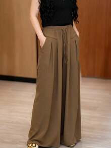 Elegantes pantalones culotte Yamamoto de cintura alta, con pliegues, drapeados, sueltos y holgados Pantalones ligeros y casuales de pierna ancha para mujer, para primavera/otoño. Elegantes, con pliegues, tallas grandes, cintura alta, corte holgado y relajado, estilo Yamamoto, con botones en la cintura y cordón ajustable. Pantalones casuales de pierna ancha y color liso. - Café integral - Ver 4