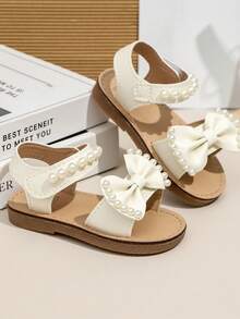 2026 Girls Pearl Bow Decor Soft Non-Slip Open Toe Lace-Up Flat Sandals, Suitable For Summer Celebrations, Daily Outings, Elegant Attire, And Birthday Parties - Beige - View 3