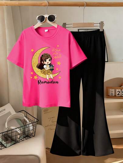This Casual Set Is Designed For Young Girl And Features A Unique Crescent Moon Print. The Set Includes A Fuchsia Short-Sleeved Crew Neck T-Shirt And Mid-Rise Flared Trousers, Perfect For Summer Wear