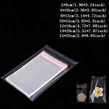 100/200Pcs Self-Adhesive Sealing Clear Opp Bags, Resealable Plastic Bags For Large-Scale Packaging Of Small Gifts, Party Favors, And Toys,Suitable For Items Of Different Sizes, Can Be Used For Clothes, Shirts, Pants, Party Gifts Packaging,Solid Packaging Bags For Holiday Gift Giving,Gift Bag - Clear - View 7