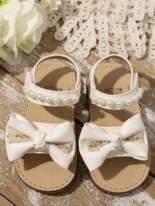 2026 Model Girls' Pearl Decor + Floral Bowknot Sandals, Comfortable Material, Non-Slip, Open Toe Design, Multi-Strap Flat, Elegant Princess Style Children Summer Sandals, Suitable For Vacation Outfits, Daily Wear, Family Gatherings And Outdoor Activities - Beige - View 2