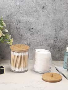 现代圆形棉签收纳盒，亚克力材质，非常适合浴室梳妆台收纳。适用于棉签、化妆球、棉片、化妆海绵、浴盐等。- 4个装 - 透明，带竹制盖子。 - 彩色 - 查看 5