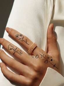 30张防水黑色小号图案临时纹身贴纸，蝴蝶、星空、花朵、爱心纹身图案，男女通用，一次性假纹身，可用于手、腿、手臂、脸、手指、脖子和身体其他部位。 - 黑色 - 查看 2