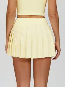 MASKERT Women's High-Waisted Pleated Sports Mini Skirt, Built-In Shorts For Anti-Exposure, Side Button Pocket, For Tennis And Fitness - Light Yellow - View 2