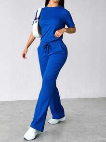 Conjunto dos piezas pantalón holgado pata de elefante playera manga corta cuello redondo comodo tela ligera comoda - Azul - Ver 1