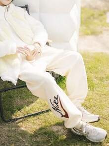 Nike Women's Logo Print Training Knit Sweatpants, - Off White - View 2