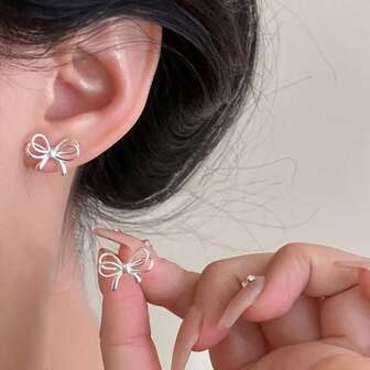 Hollow Bowknot Faux Pearl Women's Earrings, Niche Design, Exquisite, Luxurious, Fashionable, Minimalist, Versatile, Elegant, Chic Jewelry