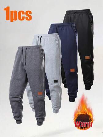 男士休闲弹力腰带保暖锥形裤，简约时尚，适合秋冬季穿着