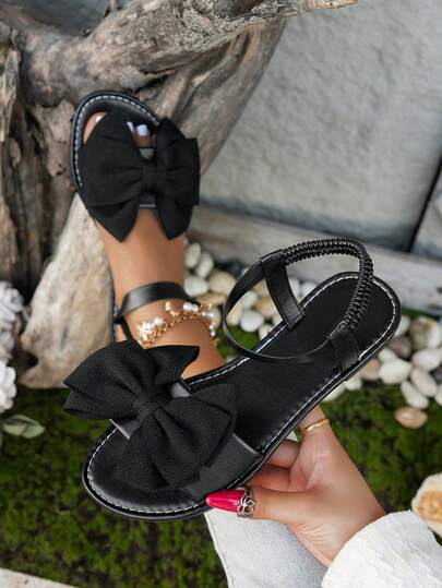 1 paar open teen ademende modieuze sandalen met strik voor dames, schattige instappers in zwarte kleur voor vakantie en strand, comfortabele plus-size bestverkochte schoenen voor dames in buitenlandse handel