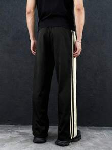 男士宽松休闲运动裤，舒适宽松时尚运动裤，适合户外、健身、徒步、跑步、秋冬季穿着。 - 黑色 - 查看 4