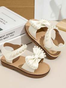 2026 Girls Pearl Bow Decor Soft Non-Slip Open Toe Lace-Up Flat Sandals, Suitable For Summer Celebrations, Daily Outings, Elegant Attire, And Birthday Parties - Beige - View 5