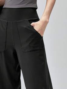Pantalones de yoga de cintura alta casuales de pierna ancha con bolsillos, pantalones deportivos ligeros para fitness y uso diario para mujeres - Negro - Ver 6