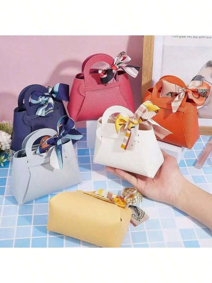 12/20个创意DIY仿皮礼品袋，适用于各种场合的派对礼品包装和装饰；包含蝴蝶结和丝带；适合所有年龄段；是商店开业、派对、烘焙、万圣节、圣诞节、生日、中国新年等的理想选择；优雅的高品质礼品包装；多种颜色可选。 - 彩色 - 查看 1