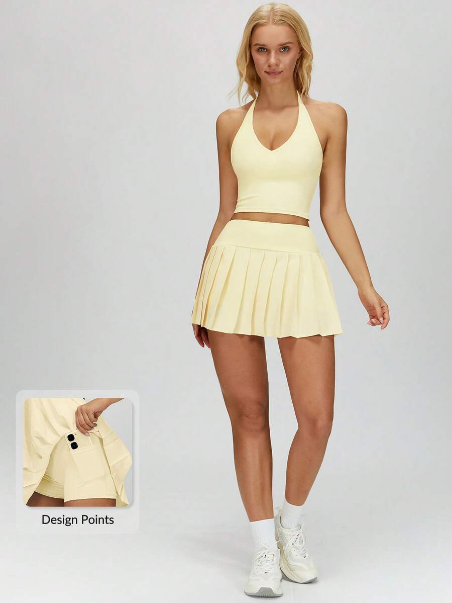 MASKERT Women's High-Waisted Pleated Sports Mini Skirt, Built-In Shorts For Anti-Exposure, Side Button Pocket, For Tennis And Fitness - Light Yellow - View 1