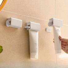 1pc Magnetic Toothpaste Dispenser, Manual Squeeze, Hygienic Toothpaste & Cream Storage Rack, Plastic Material, No Power Needed, Easy Installation - Essential Bathroom Accessory - Multicolor - View 2