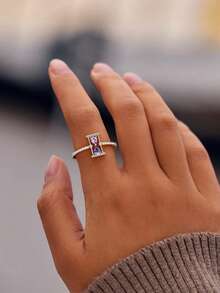 A Customisable, Enchanting Twin-Stone Ring, Where Two Resplendent Gems Symbolise Your Unique Bond-Each Representing One Of You-Set Within An Elegant Design, Proclaiming How Love Transcends Time Itself.