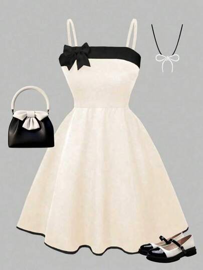 This Elegant And Fashionable Summer Girls' Dress Features A Classic Black And White Color Block Design With A Bow Shoulder Strap. Suitable For Birthday, Party, Daily Outdoor Travel, And Also Makes A Great Gift For Children.