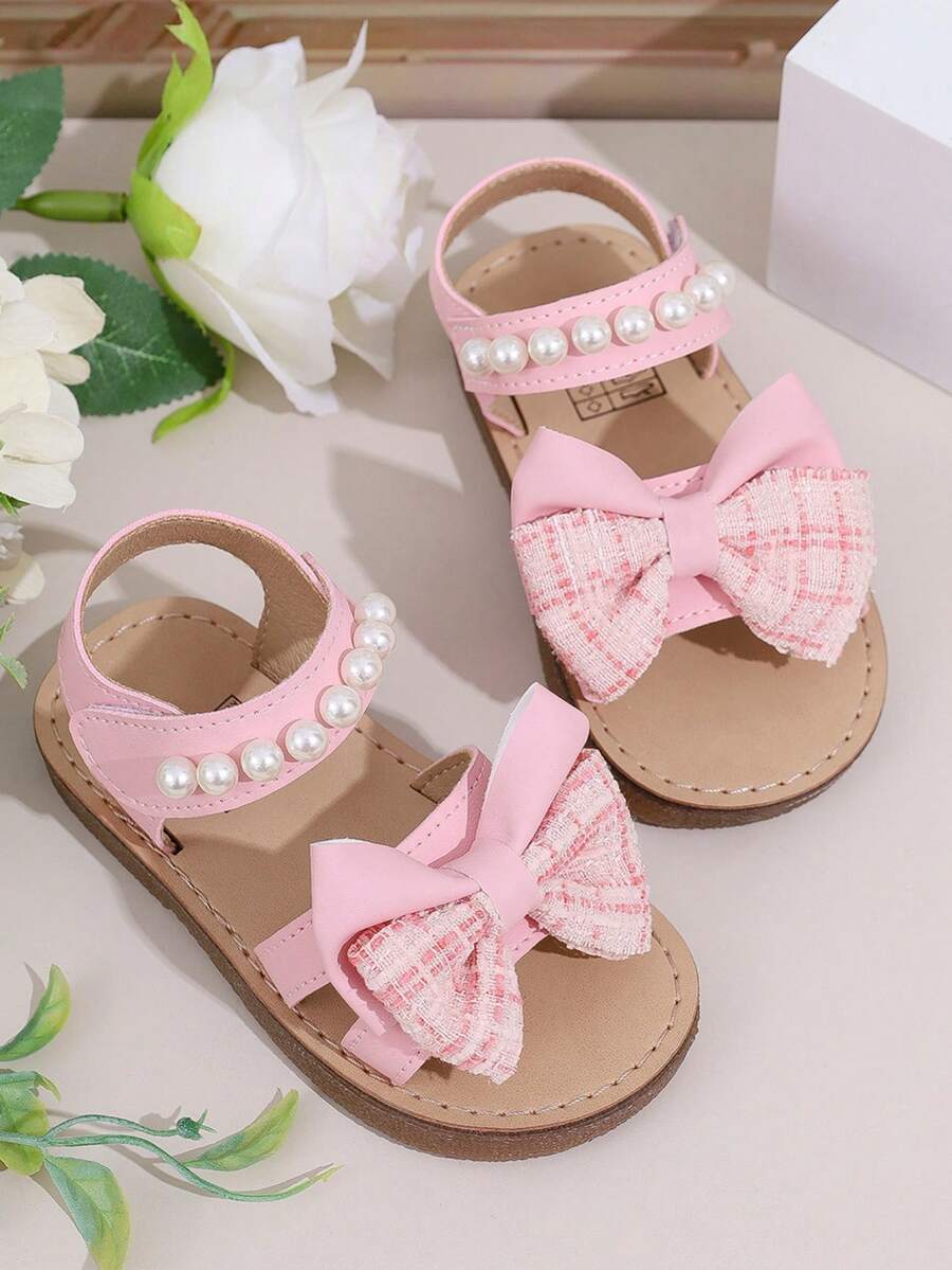 2026 Girls' Pearl Decor Sandals, Adorned With Plaid Oversized Bow, Soft Upper Material, Non-Slip & Durable, Open Toe Design, Flat, Elegant Princess Style, Suitable For Daily Shopping, Festivals And Birthday Parties - Pink - View 1