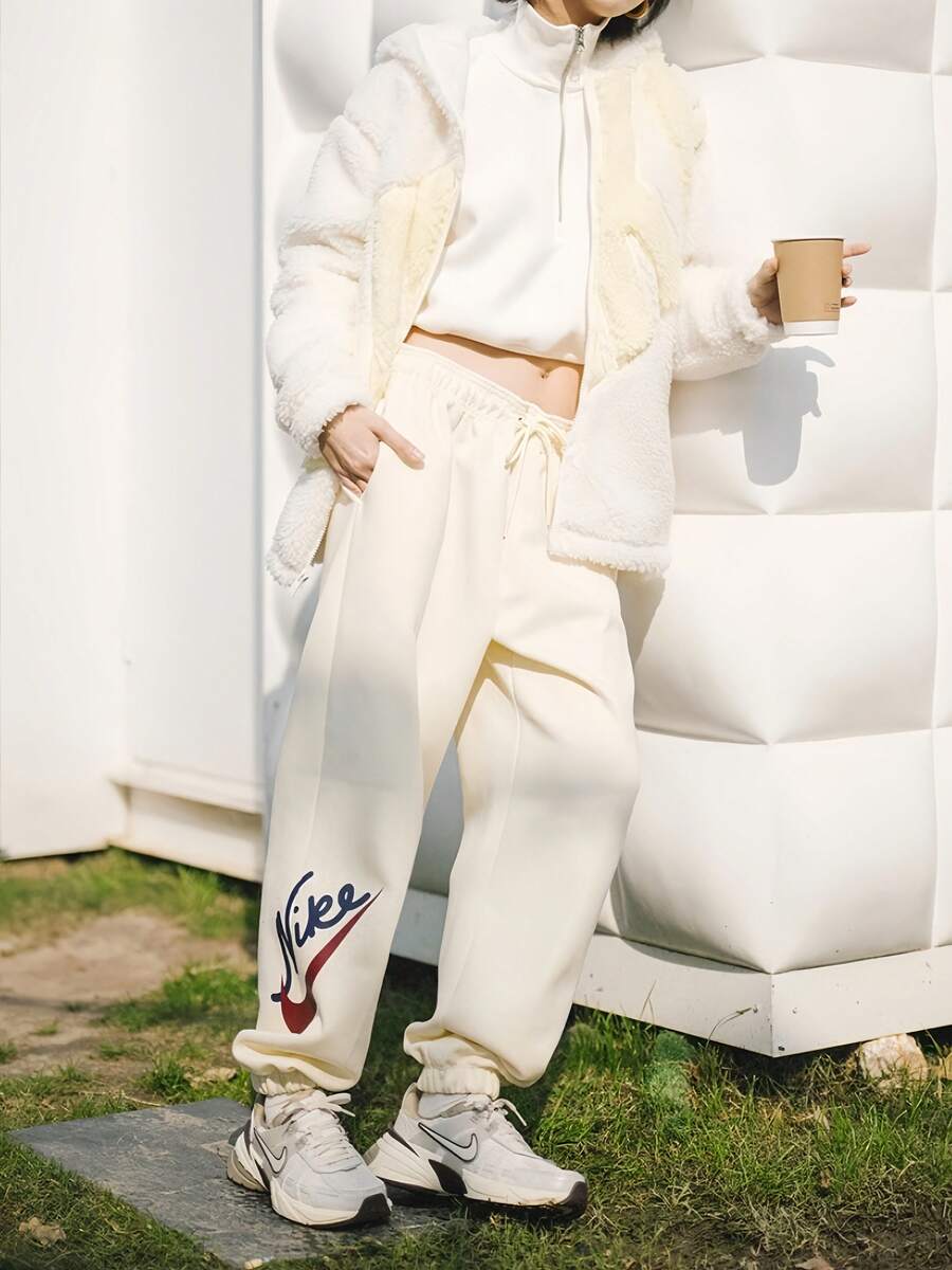 Nike Women's Logo Print Training Knit Sweatpants, - Off White - View 1