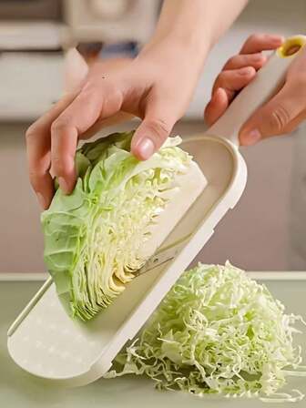 A 1-Piece Multifunctional Vegetable Slicer With Brush For Salads, Cabbage, Carrots, Radishes, Cucumbers, And Stainless Steel Blades. This Handheld Vegetable Slicer Is Perfect For Broccoli And Salads, And Is An Easy-To-Use Kitchen Tool For Thinly Slicing Cabbage. The Plastic Frame And Sharp Blades Ensure Efficient Slicing, Making It Ideal For Home Cooking And Salad Making.